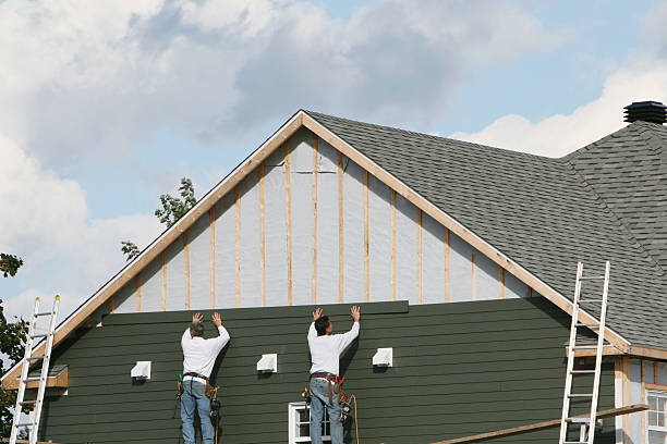 Professional Emergency Siding Repair technician working in Tomball, TX